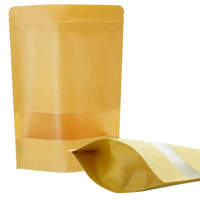 Paper based flexible packaging with kraft stand up pouches and barrier layers