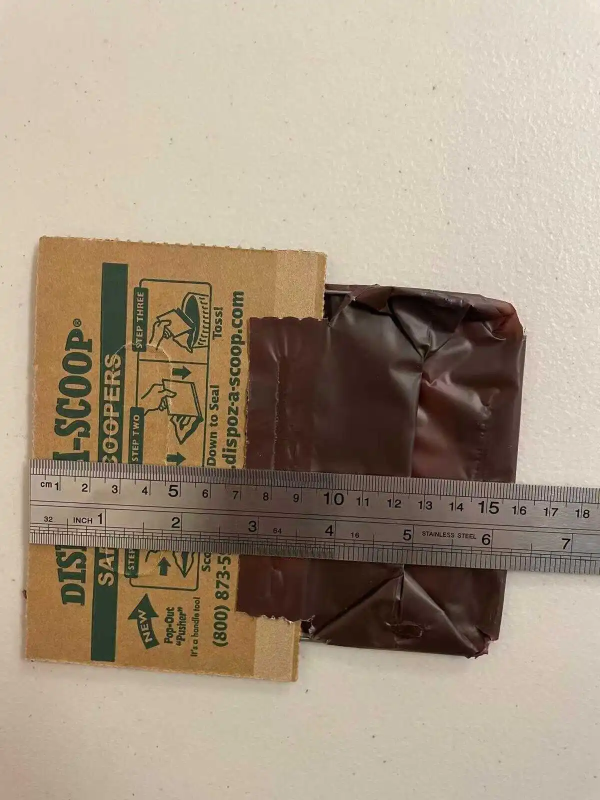 Dog waste bag sample being measured during product development for a U.S. pet-care project
