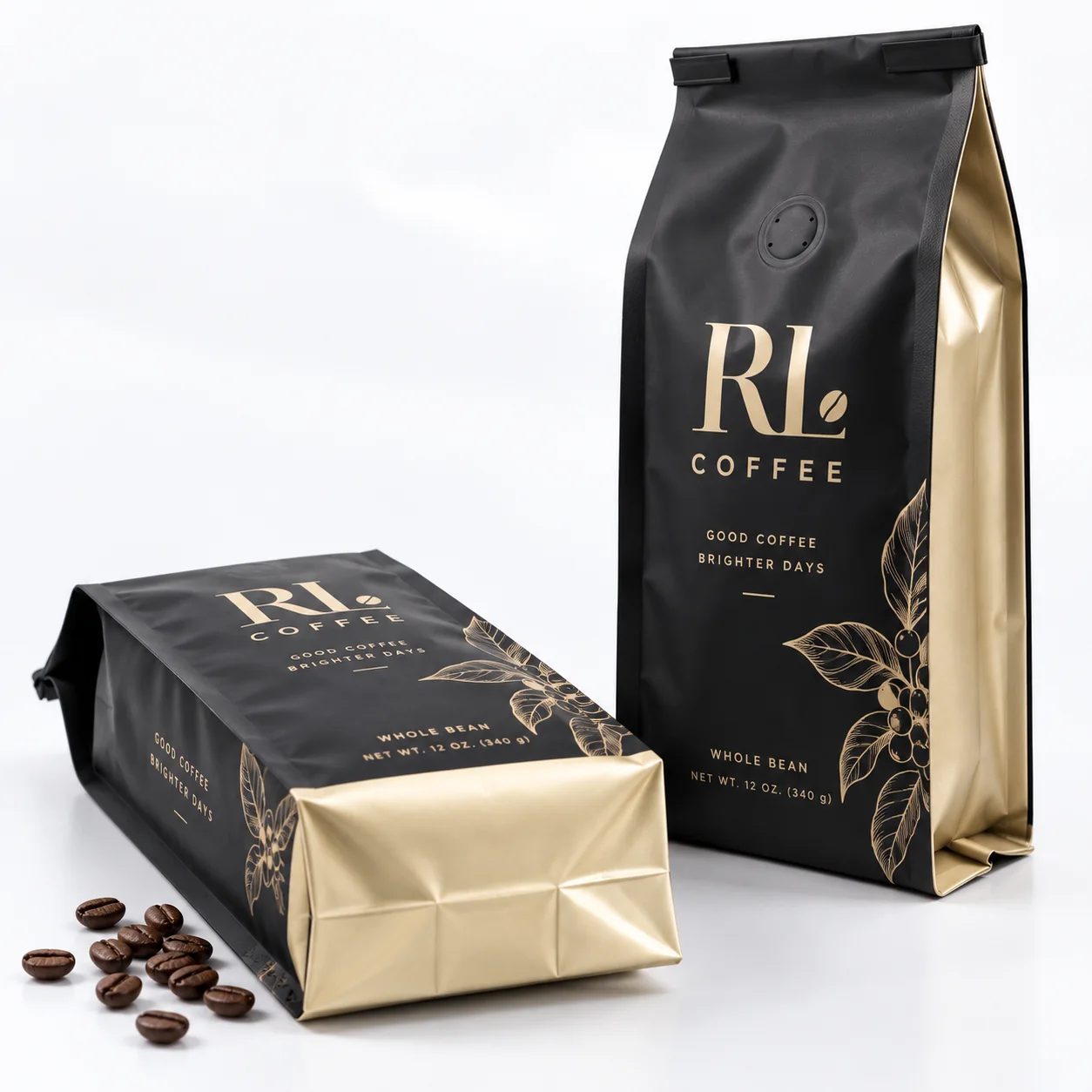 Two black and gold custom side gusset coffee bags showing upright and horizontal product views